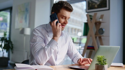 Poster - Overwhelmed office manager calling smartphone typing laptop at workplace closeup