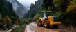 © Chaithat - an all wheel drive tractor navigates through a muddy road flanked by forested areas during what appears to be a rainy day, with overcast skies providing a soft light to the scene