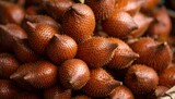 peeled salak revealing scaly skin
