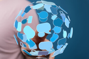 Poster - Abstract image of a person interacting with a sphere of communication bubbles.  Illustrates global connectivity and digital conversations.