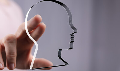 Poster - Abstract image of a hand interacting with a transparent head profile.  Perfect for AI, technology, or mental health concepts.