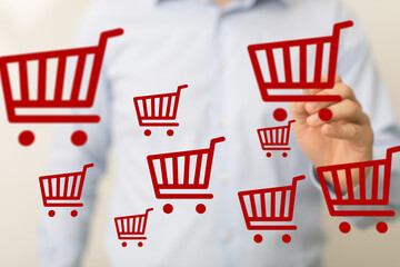 Aufkleber - Person drawing multiple shopping cart icons on a touchscreen. Concept for online shopping, e-commerce, and digital marketing.