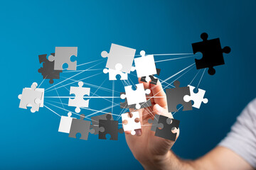 Aufkleber - Abstract image of interconnected puzzle pieces.  Represents teamwork, problem-solving, and strategic partnerships.
