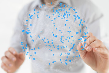 Leinwandbilder - Image of a person interacting with a global network visualization. Ideal for technology, communication, and business concepts.