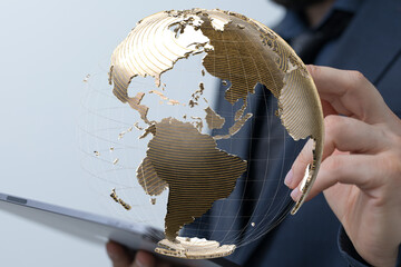 Poster - Image of a person interacting with a 3D digital globe, symbolizing global business and networking.