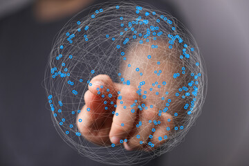 Leinwandbilder - Abstract image of a hand interacting with a digital sphere representing global network connections.