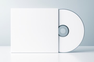 Poster - Blank white CD case and disc on glossy surface with soft light background for clean product mockup, design presentation, or advertising concept.
