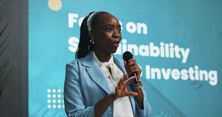 Poster - Black woman, presentation or seminar with mic for speech or environmental change at summit. Female person, employee or speaker with technology display for eco friendly investing or sustainability