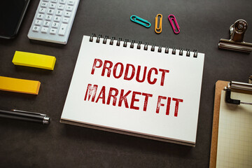 Poster - There is notebook with the word Product Market Fit. It is as an eye-catching image.
