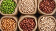 © PaulShlykov - Assorted beans in burlap sacks arranged in a grid pattern for culinary or market use