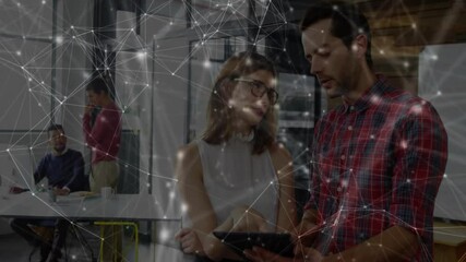 Poster - Woman and man powering tablet loading business chart finishing review with pulsing network overlay