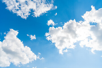 Wall Mural - Clouds at the sky. Cloudscape - Blue sky and white clouds. Beautiful blue sky background with clouds. White fluffy clouds in the blue sky. Blue sky and white clouds of daytime