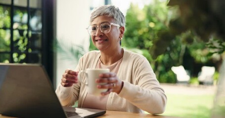 Poster - Drink, laptop and remote work with mature woman in home office for small business research. Coffee, computer and glasses with freelance employee reading information in apartment for startup job
