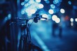 © Ifti Digital - Bokeh lights create a dreamy atmosphere behind a parked bicycle at night in an urban setting, A nice blue Bokeh effect that can be used for backgrounds, transitions, overlays and design elements