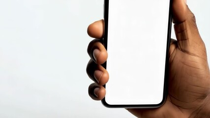Poster - African American hand holding smartphone device with blank white screen for app interface mockup against neutral background. Mobile technology concept.