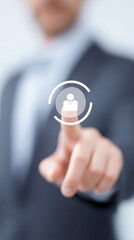 Poster - Business professional in a suit is interacting with a digital interface, pointing at a user icon, showcasing modern technology and user engagement in a corporate environment
