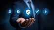 © Lulwa - Hand holding digital security icons