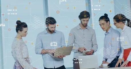 Poster - Bearded male typing on laptop triggers tech team tapping tablet at table, data overlays appearing