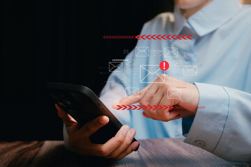 Poster - Email concept. Businessman Using Smartphone with Email Notifications on Screen in a Dark Setting