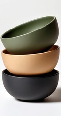 Aufkleber - Stack of Three Ceramic Bowls in Green, Beige, and Black, Showcasing Minimalist Design and Modern Tableware : Generative AI