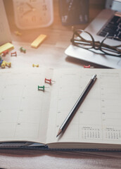 Wall Mural - pins on calendar book for planner and organizer to plan and reminder daily appointment, meeting agen