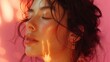 © Pinklife - A serene woman with a soft expression showcases her natural beauty under warm light, emphasizing the glow of her skin and the gentle flow of her hair in an intimate moment.