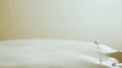 Poster - A single splash of milk on a white surface
