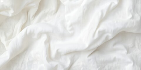 Poster - A close up shot showing the texture of a white fabric with soft folds and subtle shadows present