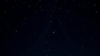 The night sky studded with slow-moving stars