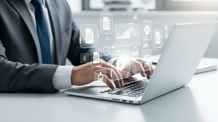 Poster - Man in suit typing on laptop with document and security icon overlays on a white office desk space