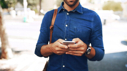creative, man and hands with phone in city for travel, ride schedule and taxi app for trip booking. 