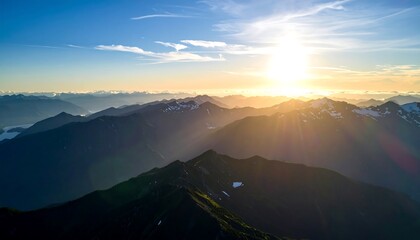 Aufkleber - Mountain peaks at sunrise.
