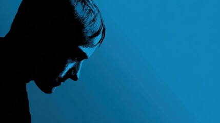 Poster - Warning Signs of Suicidal Thoughts Represented Through a Silhouette of a Person With a Blue Background, Highlighting the Impact of Mental Health