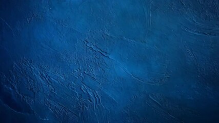 Poster - Textured blue stucco surface with artistic swirls, rough cast, abstract dark paint wall, for backgrounds and designs.