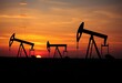 © DITSARAPHAN - Silhouetted oil pump jacks at sunset, vast oil field ,  silhouette,  refinery