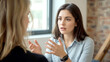 © Ada - Confident focused businesswoman, teacher or mentor coach speaking to business people at negotiations, woman leader speaker applicant talking at meeting or convincing hr during job interview concept