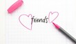 © Vladimir - Doodles of hearts surrounding the word 'friends' on notebook paper