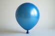 © Borasca - Vibrant blue balloon against neutral background: a minimalist touch