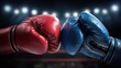 © hits - Boxing gloves, red and blue, meet in the ring