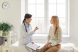 © Studio Romantic - Feminist health clinic, supporting caring female doctor meeting, greeting, consulting young woman patient, offering medical advice in gynecology, sexual health, fertility, menopause, helping