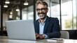 © halo - businessman working on laptop