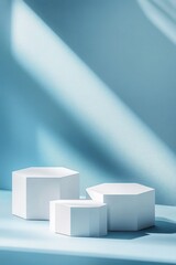 Poster - Three White Hexagonal Podiums on Light Blue Textured Background with Sunlight