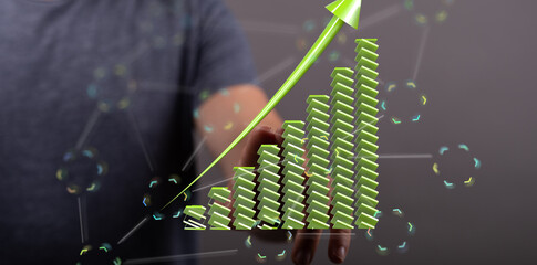 Aufkleber - Stock photo of a hand interacting with a 3D bar graph showing significant growth and upward trend.
