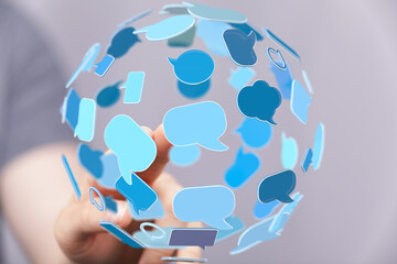 Aufkleber - Abstract image depicting global communication and networking.  Hand interacts with 3D speech bubbles.