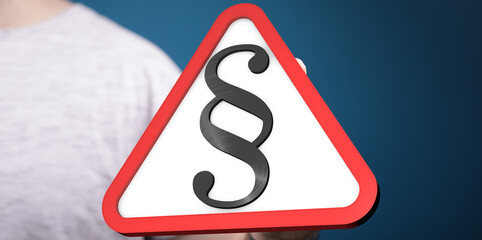 Aufkleber - Hand holding a triangle warning sign with a paragraph symbol.  Legal notice concept.