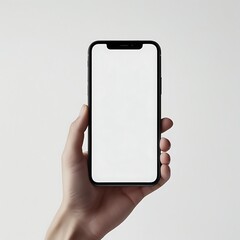hand holding smartphone with blank screen mockup
