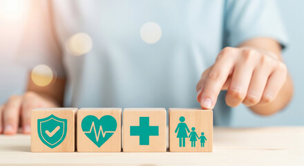 Poster - Wooden blocks with health icons: shield, heart, cross, family.  Showcase of health insurance concept, symbolizing protection, care, and family well-being