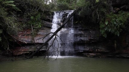 Canvas Print - Waterfall cascade view after rainy days.