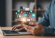 © Md - Person using a smartphone and laptop with communication icons