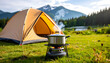 © Damang - Cooking Outdoors in Mountain Landscape: A Camping Scene